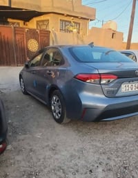 كورلاا 2022  LE. رقم بغداد سيارة ماشية 50الف مكاني بغداد ابو غريب سعره...