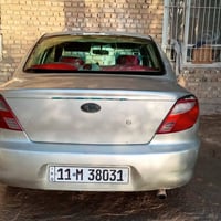 كيا ريو كير عادي موديل 2000  صفر غرامة بيهة تنقيص وصبغ حزام  وبيهة ضرب...