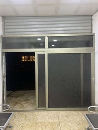 باب سلايت ألمنيوم • ٢م٤٥×٢م٩٢ • كركوك حي النصر