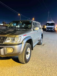 نيسان باترول . موديل 2002 سوبر سفاري مكينه 4800 فتك . 3 قطع تبريد + ثل...