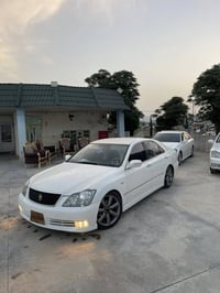 ٢٠٠٥ • أبيض سبورت • داخلية سوداء