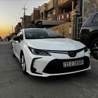 كورلا هايبرد 2025 كفالة عامة مكينة 1800 ماشية 28 فتحة سقف  كراسي جلد  ...