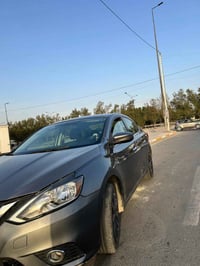 نيسان سنترا موديل 19 ماشيه 67 الف بيه بنيد وبارد بجاملغ فقط واكو طخه م...