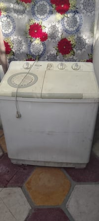 غسالة • الغسل يتشغل