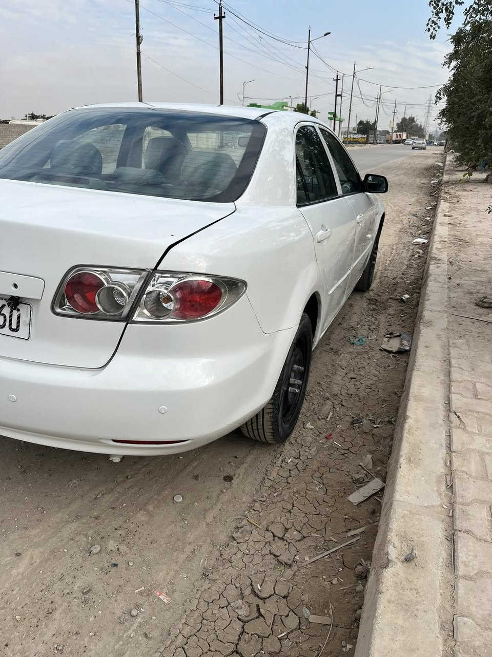 البيع او مراوس حسب القناعه سياره مازده مديل 2003 مصبوغه عام جماليه سياره كله بلاديه كير مكينه جديده دواخل سياره حلوه مكاني الدولعي رقم ***********
