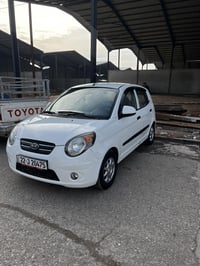 كيا بيكانتو 2010 سيارة جديده وحلوه مكينه وكير شرط تبريد وتاتفيه كلها ش...