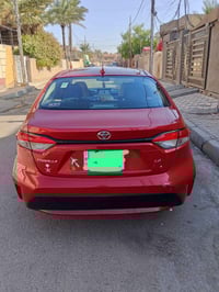 كورلا  وارد امريكي رقم بغداد  حادث خلفي السعر 150$وبيها مجال  07700409...