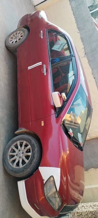 لانسر ٢٠٠٢ • محرك وكير شرط • رقم بغداد