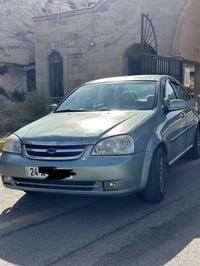 موديل ٢٠٠٨ لون فستقي كير عادي سنويه باقي اقل من سنه تسقط ٣ قطع الامامي...