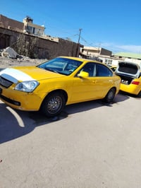 اوبتيمه امريكيه  موديل 2008گير محرك توهن مشدودات تخم تايرات جدد سعره 8...