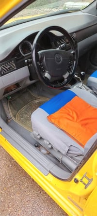 عندي سياره اوبتره موديل ١٢ البيع ٠٧٧١٠٩٤٠٢٨٦