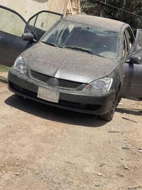 للبيع لانسر 10مكينه كير حداديه كله جديد  تخم تاير سياره مناقصه شي السع...