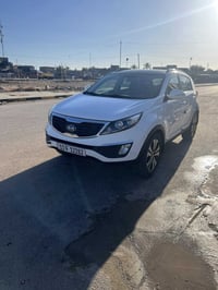 كيا سبورتج 2011 رقم بغداد انكليزي سنويه بيها قطعه صبغ والسونار موجود ب...