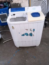 غسالة هيتاش مابي باب شرط الفحص السعر 30الف07824166797