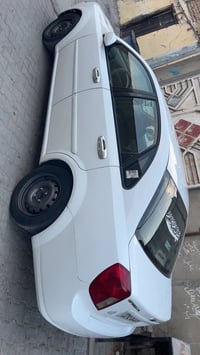 اوبترا 2012 رقم بغداد انكليزي سياره كامله كل نقص مابيه كير مكينه حدادي...