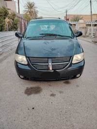 دووج كرفان موديل 2006 لون اسود محرك 3800 الطويلة كشنات سياحي بلع تبريد...