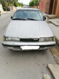 سياره للبيع نوع مازدا (Mazda) السياره رقم الماني مسطره كير عادي كاربون...