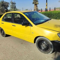 للبيع لانسر 2006 بيها خيط تبخير بدون تنقيص (كلوب الويل بم مشتغل وساخه ...