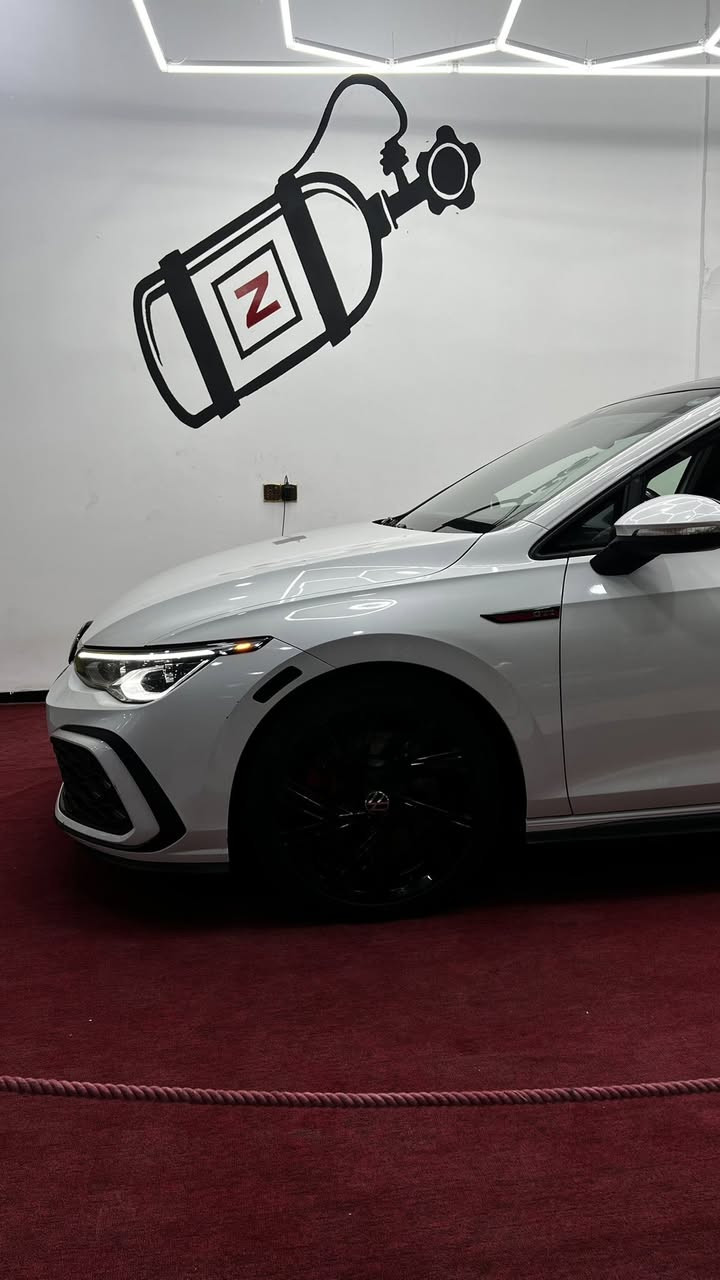 السلام عليكم 
 
فلوكس واكن كولف Gti se 2023 فول مواصفات
محرك 2.0 توربو اقوى محرك من انتاج vw
كير عادي 6 نمر رياضي دبل كلتش مع كلتش 
سرعه السياره 320 💨
💥مواصفات السيارة 
شاشة عدادات Digital Cockpit 10.25 إنج
* شاشة معلومات 10 إنج
* Apple CarPlay + Android Auto لاسلكي
* شحن لاسلكي
* مقاعد  قماش GTI حظن سبورت بكچ
* تسخين مقاعد وستيرن
* فتحة بانوراما
* إضاءة داخلية Ambient Lighting  متغيرة باكثر من 80 لون 
*مراقبة النقاط العمياء 
*مودات للسرعة
*اوتو ستارت. اوتو ستوب
*تحديد مسار وقفل سرعة 
*انارة محيطية 80 شكل
* دخول ذكي وتشغيل بصمه 
* حساسات محيطية مع كامرة دوارة 
* رادارات محيطية امامي وخلفي وجانبي 
* رادارات الخروج عن مسار والتوقف الذاتي ونقطة عمياء 
* اضائة امامي وخلفي led مع عدسة داينمك 
💥عليها تخم تاير مشلن اصلي
💥حادث السيارة مع التصليح مرفق في المنشور 
💥محرك + كير + حدادية + كهربائيات مكفولات
السياره جاهزة للاخر ترايها دول مو بس محافظات 
 للاستفسار الاتصال على هذا الرقم
*********** رقم الهاتف
