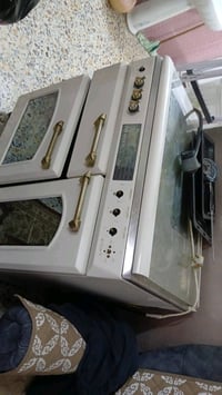 ميز مع ست كراسي 100 الف الكاونتر100 والطباخ400