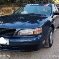 نيسان ياباني موديل ١٩٩٨ اوتوماتيك كير محرك مكفولات تدفئه تبريد السياره...