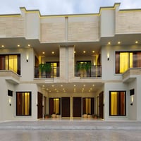 واجهة منزلين متماثلين 15 متر في منطقة المنصور من تصميمي  المهندس عمر ا...