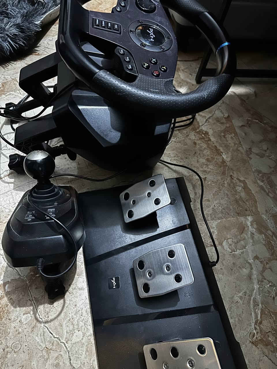 دركسون PXN V9 لببيع
استعمال قليل نظافة 100% 
فره ونص يرهم بلايستيشن 3و4 واكس بوكس سيريس اس وX والبي سي
كامل ملحقات الگير والدواسات والكارتون
السعر 90 الف وبيه مجال بسيط
مكاني الناصرية
***********
