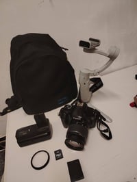 كانون دي ١١٠٠ • عدسة ١٨-٥٥ • نظيفة كلش