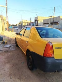 رينو موديل 2009 رقم بغداد بسمي مكينه وكير مكفولات تبريد شغال 077535833...