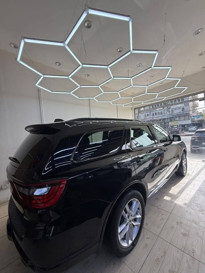 دوج دورانكو جي تي امريكي للبيع
Dodge Durango GT .
الموديل : 2023. (امريكي)
المحرك : V6 . 3.6L .
العداد : ماشيه اكثر من 45 
اللون : اسود لامع 
*الرقم الانكليزي بغداد مشروع الوطني 
المواصفات :
* رادار امامي  مع مانع تصادم . 
* تحذير الخروج عن المسار. 
* تحذير النقطة العمياء . 
* حساسات امامية وخلفية .
* فتحة سقف (سلايد) . 
* مقاعد جلد ومخمل  . 
* مقاعد كهربائية مع ذاكرة لحفظ وضعيات الجلوس. 
* مقاعد  تدفئة. 
* تدفئة مقود القيادة. 
* مقود رياضي . مع شفتات 
* مصابيح امامية زنون مع LED .
* كشافات ضباب LED . 
* شاشة 10.1 أنج .
* نظام ملاحة (GPS) . 
* تشغيل عن بعد . 
* دخول ذكي بدون مفتاح.
* بصمة ابواب .
* ⁠اشاير بالمري الجانبيه.
* ويل قياس 20 أنج . 
* صندوق كهربائي . 
* بلوتوث تلفون .
* محدد سرعة . 
* كاميرا خلفية .
* كير طياره .
* صف ثالث من المقاعد 7 راكب . 
* نظام سبورت .
* نظام مانع انزلاق .
* نظام ايكو اقتصادي.
* نظام اوتو بريك .
* اطفاء وتشغيل اوتماتيكي Auto start . 
*مكان السيارة/ بغداد 
(ضرر السياره• بيها 3 قطع فقط 
1_جملغات الاماميه  والبنيد 
2_الشاصي  من الجهة اليمنه  مسحوب 
على كد شبر فقط بدون اي تعمير او معجون 
الاستفسار *********** سوناره موجود
