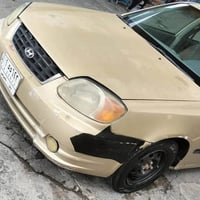 اكسنت • ٢٠٠٣ • بغداد البلديات