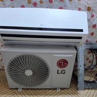 س سبلت LG الأصلي  طن ونص  اخو الجديد وهذا الموديل اخوان الي يأخذه ما خ...