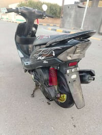 موتوسيكل ٥٥ • دراجة نارية