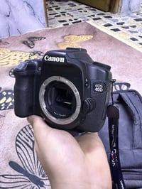 كأمره كانون D40 مستخدمه كلش قليل بعده جديده مصور بيه بس 4 صور او جنت ض...