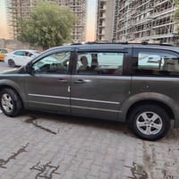 للبيع دوج كرفان موديل 2010 رقم بغداد دولي بسمي ماشيه 110 الف سياره وار...