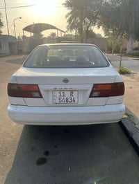 تيسان سني موديل 97 سياره بسم المالك 07701644590 مكان السياره بغداد للت...