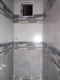 خلفه سيراميك وبورسلين ومرمر جدران  وارضيه ودروجه متفرغ حاليا لاتصال 07...