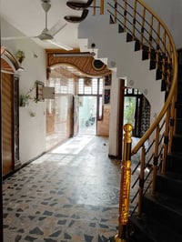 الشعب • ١٠٠م • كراج