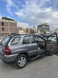 كيا سبورتج خليجي موديل 2009  مكينه 4 سلندر 2000  شاشه وكامره لون نفطي ...