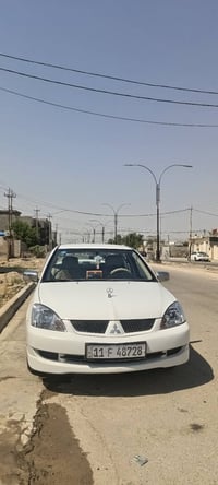 لانسر ٢٠١٠ • مكينة جديده • رقم بغداد