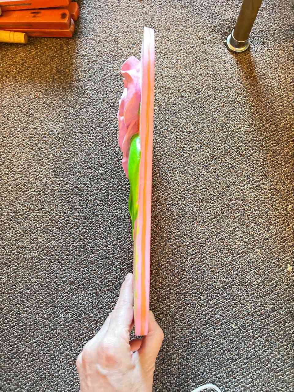 Colorful wall hanging is made of a resin or composite material. It has a pink, orange, and green striped pattern with a large 3D pink rose and green straps. A metal keyhole hanger is attached to the back for easy mounting.
Cash Burnaby, BC


**إذا كنت صاحب هذا الإعلان وتريد حذفه لأي سبب، رجاءا أرسل رسالة إلى الدعم الفني**