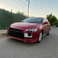 للبيع لانسر قرش موديل ٢٠١٦ رقم بغداد بأسمي سيارة مال جناي كامرتين امام...