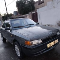مازدا للبيع 323السعر 30 وبي مجال رقم صاحب السياره 07708444759