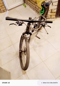 بايسكل ياباني جبلي لون رصاصي كلش نضيف  الرقم 07715575686