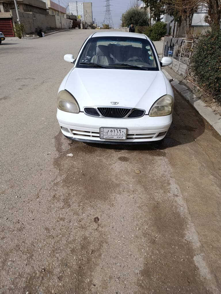 دایو نوبرا2 مودیل 99تبرید سارد و گەرم ناو فۆرمیکا مەکینەو گێڕ بە شەرت پەڵە پەڵە معجونی هەیە لەسەر ساغی سنوی بەسەر چووە کۆبۆنی بەنزینی هەیە بەشرتی تحویل رقم مبایل *********** شمشمل, السليمانية
