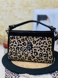 حقيبة روغان • جلد لامع درجة اولى • حجم وسط