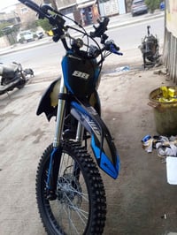 قفاز اكس موتو • ٣٠٠سي سي • ماشي أقل ألف