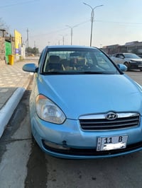 اكسنت 2009 • مكينة 1600 • رقم بغداد