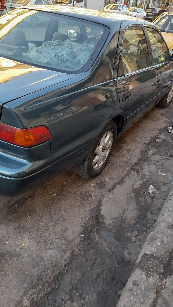 سلام عليكم كامري امريكي 
موديل ٢٠٠٠ رقم بصره  رقم الجديد باسمي سنويه وهزه جديده  تخم تاير  محرك وكير مكفولات كهربائيات كلها شغاله دوشمه جديده مصبوغه عام  حادثها جاملغ امامي   للبيع امراوس حسب القناعه عارضها ٦٥ وبيها مجال للتواصل ***********مكاني بغداد
