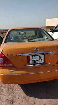 نيسان سني ياباني موديل ٢٠٠٩  رقم بغداد  انكليزي بسمي نفاذ سنوية٢٠٣١ شا...